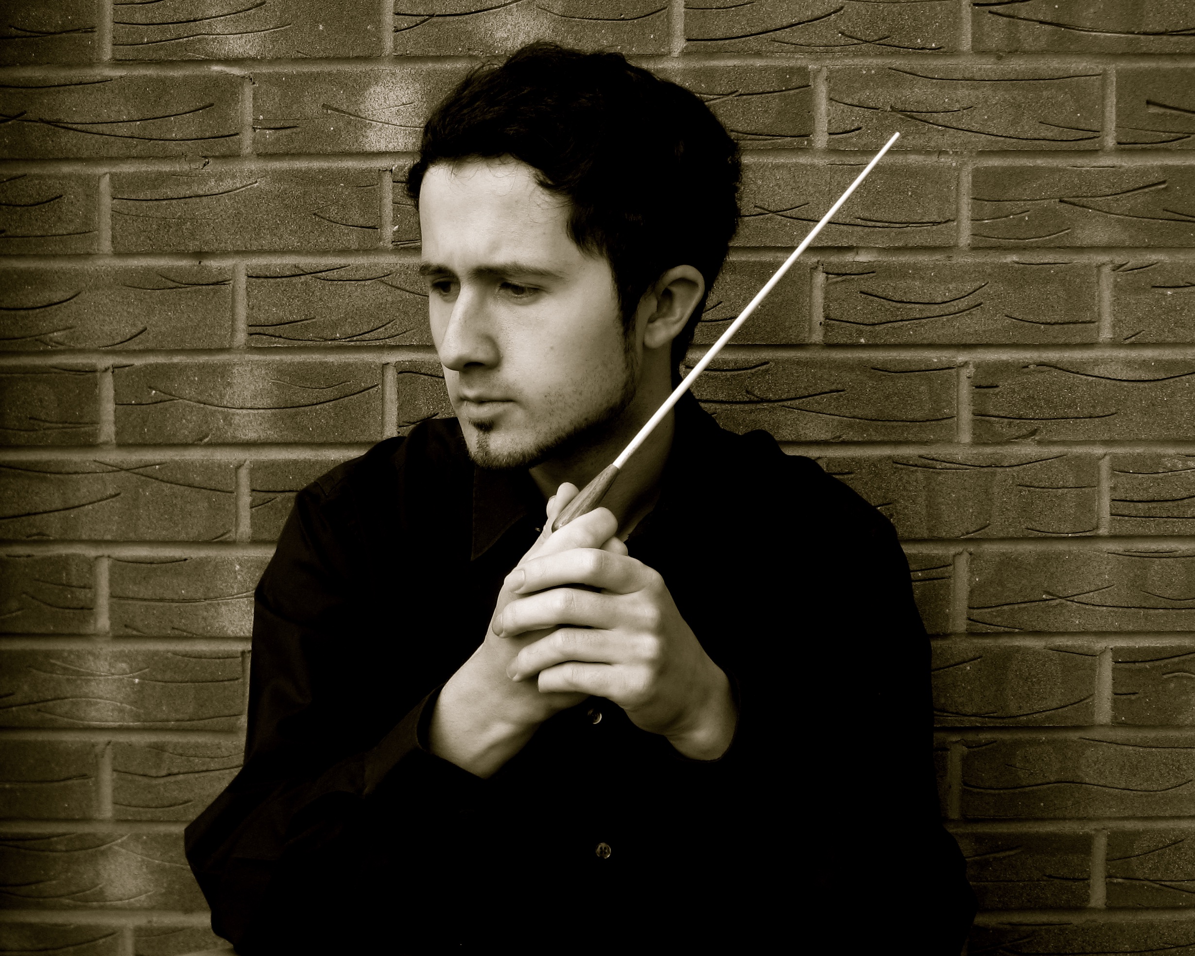 Adam Kornas, conductor